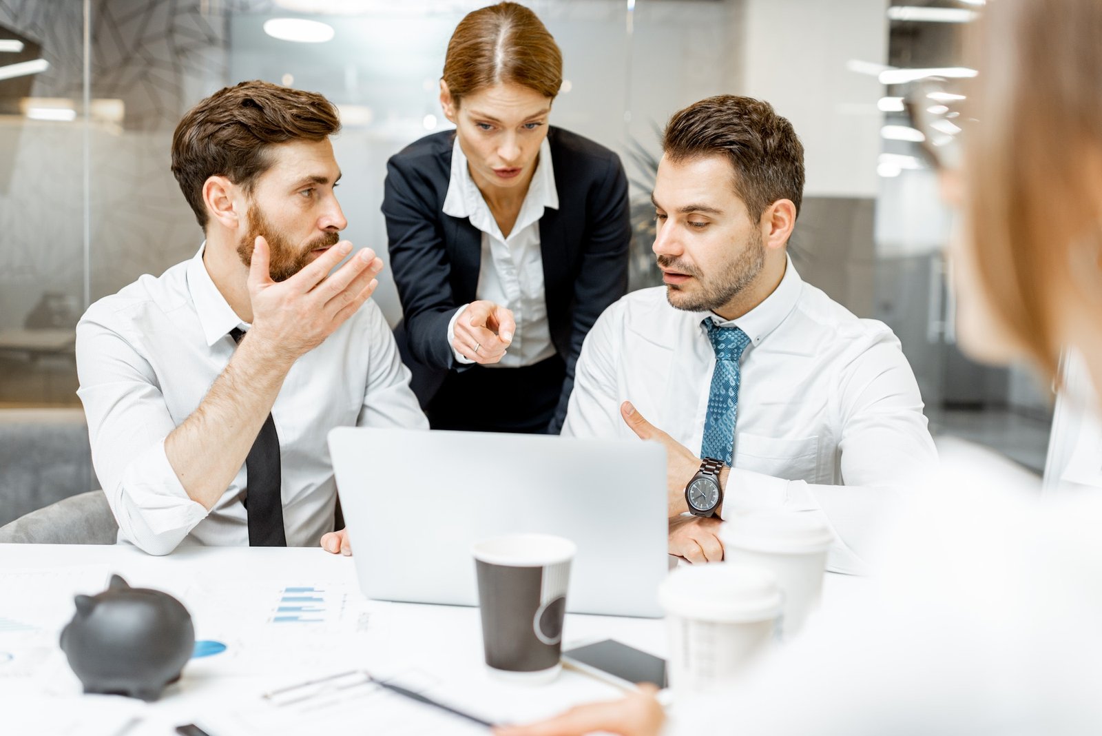 Team leader with employees in the office